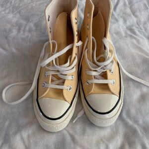 New Chuck Taylor All Star High Tops    Never worn. Light yellow.